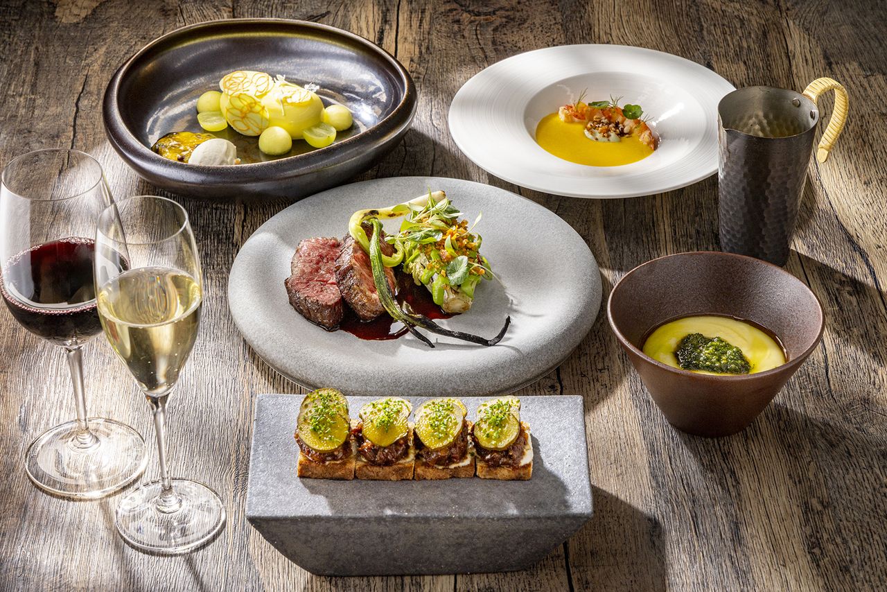 Full course lunch consisting of appetizer, soup, main course and dessert